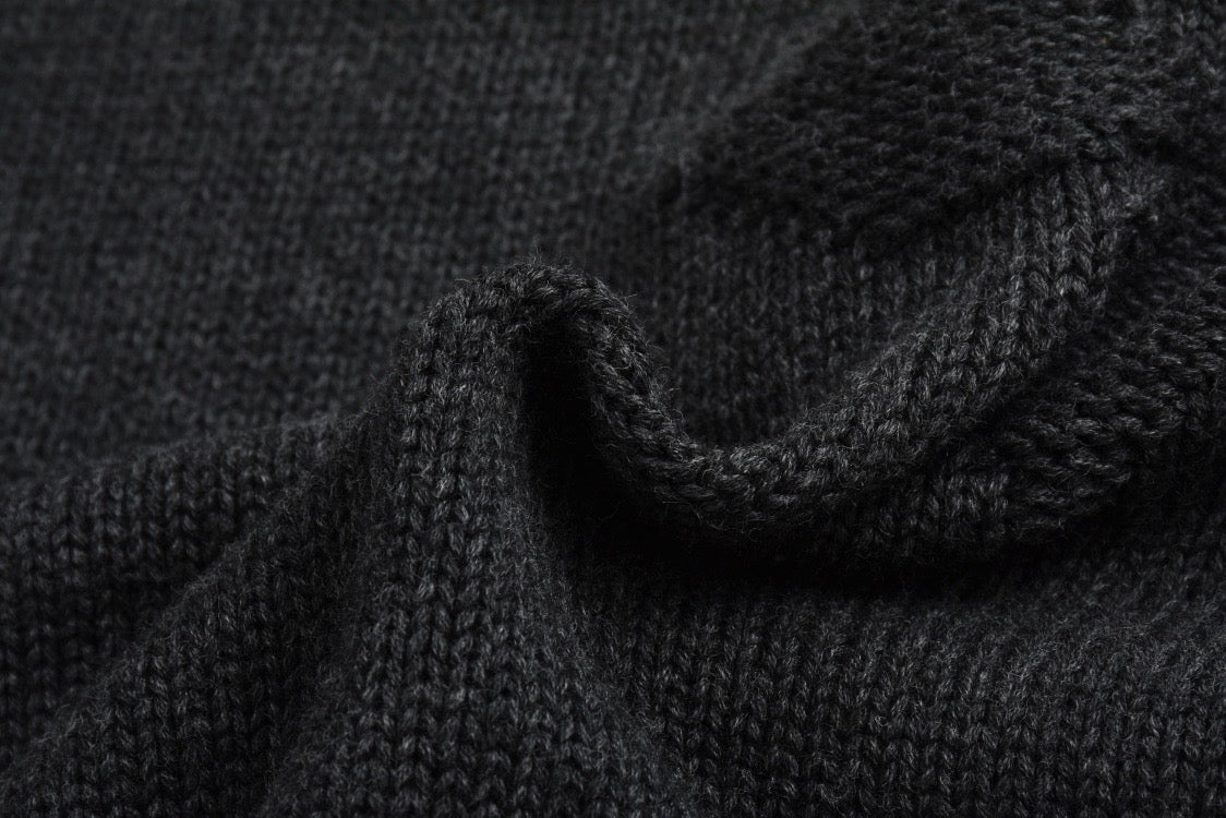 Half-zip sweater with dark jacquard pattern